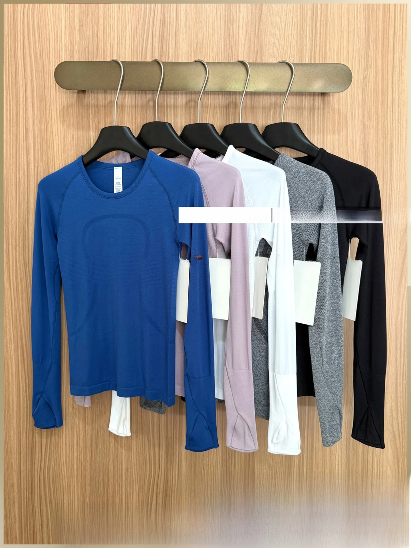 

Женская спортивная футболка LULU ZGLY с длинным рукавом для йоги и фитнеса, дышащая, влагоотводящая, быстросохнущая, с эффектом второй кожи.