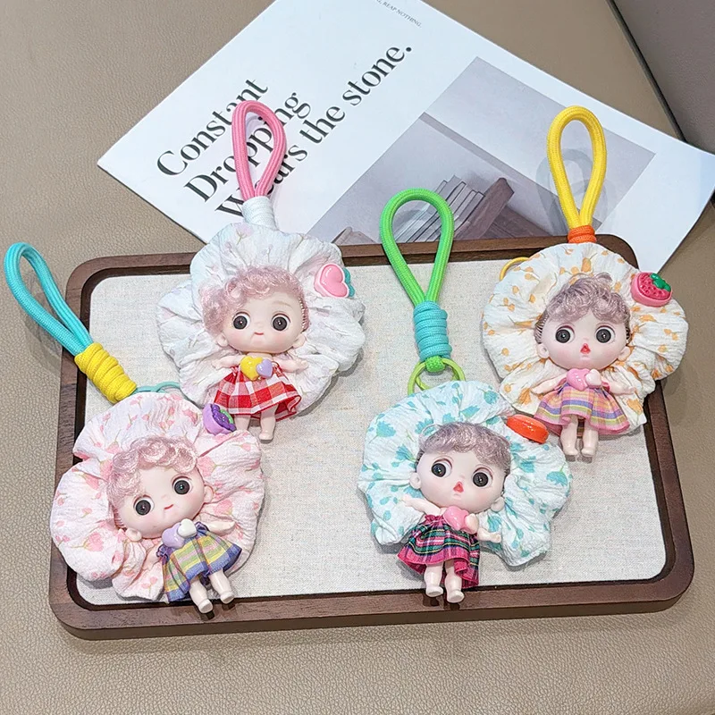 2026 New Kawaii cute cute toy cartoon doll key chain pendant hand doll bag pendant car key chain hanging.