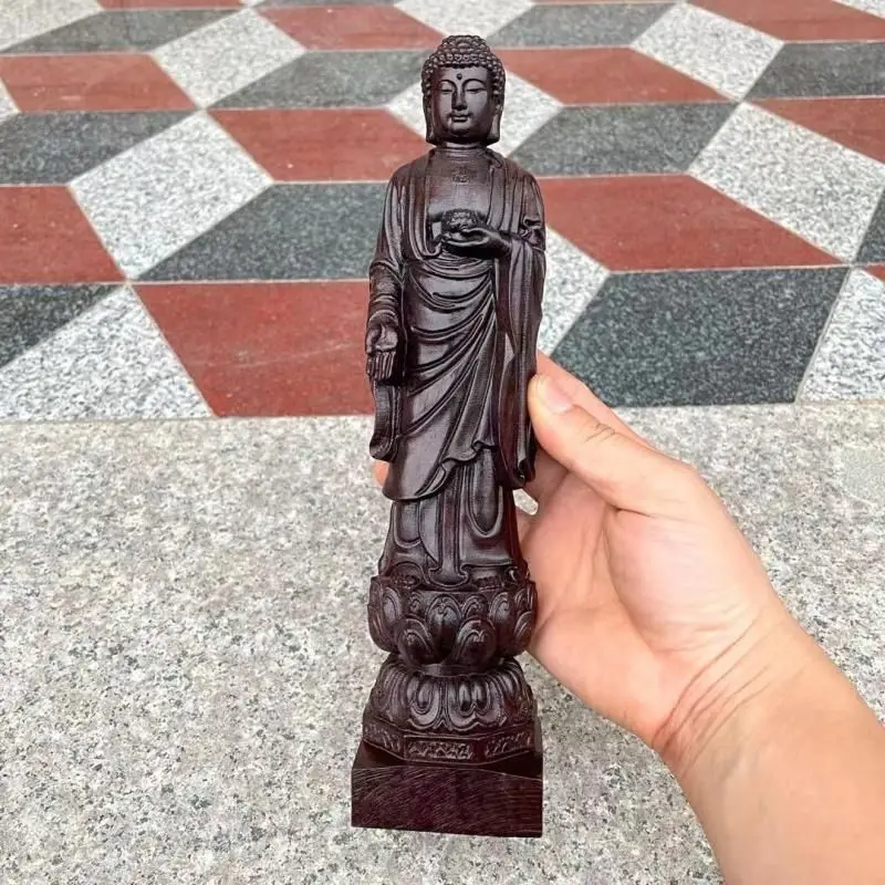 

Exquisite agarwood carving of the Great Sun Tathagata Buddha statue of Shakyamuni ni in the town house