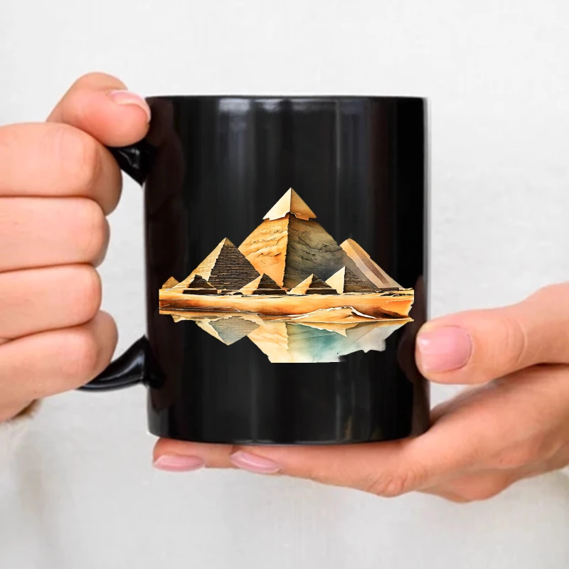 Black ceramic mug with a pyramidal landscape design for coffee, tea, and everyday use