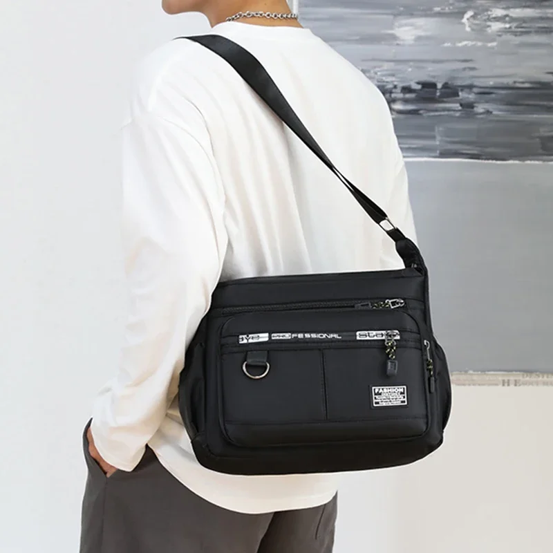 

Large-capacity commuter crossbody bag business simple texture shoulder bag multi-layer storage men's briefcase