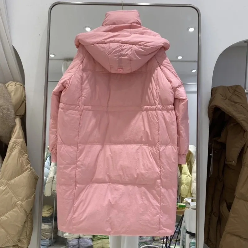 Giacca da donna media e lunga sopra il ginocchio 2025 Nuova versione coreana Moda allentata ispessita con cappuccio Piumino d'anatra bianco Marea