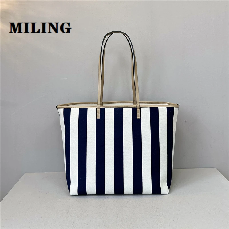 

Women Cowhide Patchwork Canvas Striped Handbag Lady Large Capacity Tote Bag Female Fashion Commuting Shopping Shoulder Bag