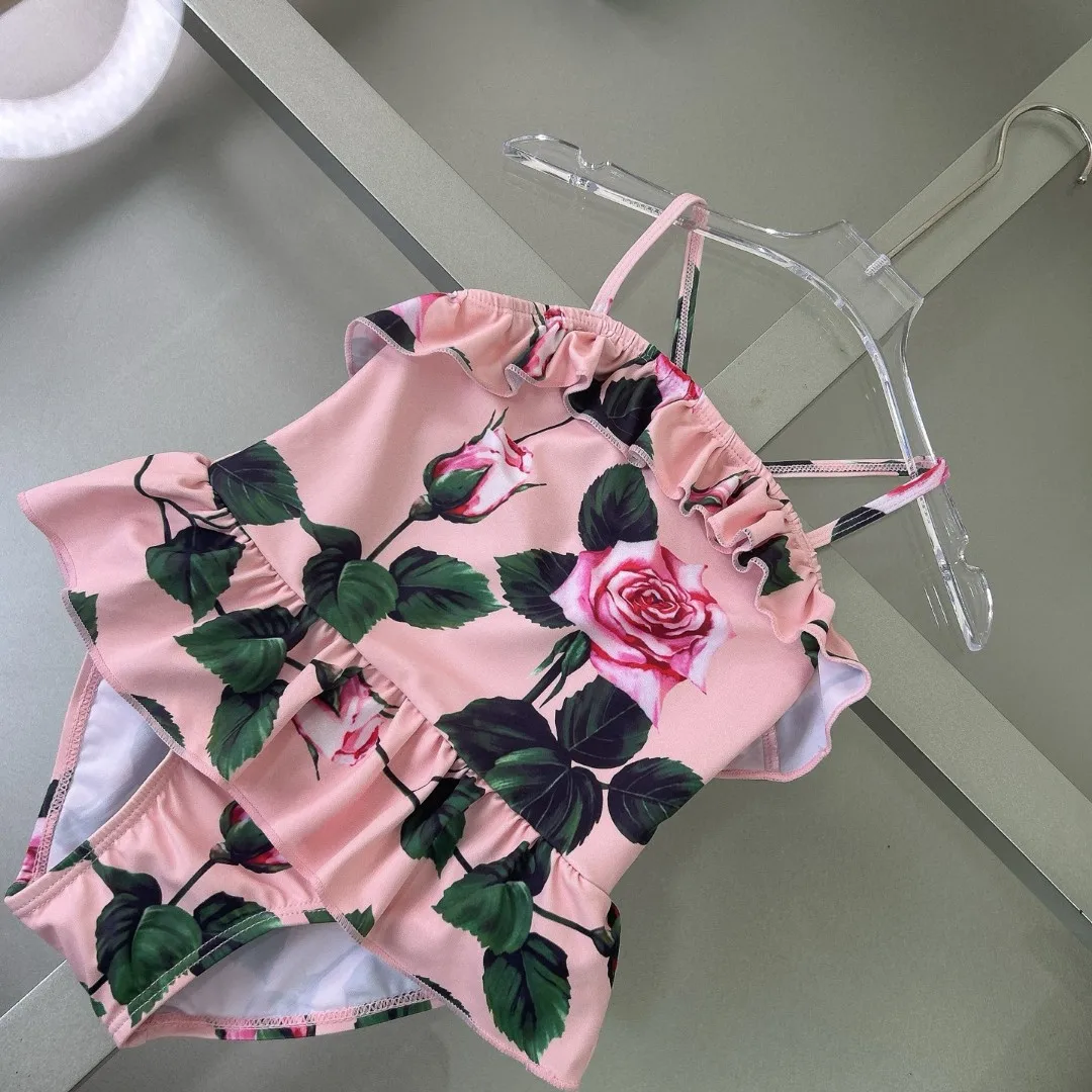 2025 nieuwe roze meisjesbadpak meisjes bikinizwempak met bloemenprint uit één stuk sling-badpak kwaliteit kinderzwemkleding