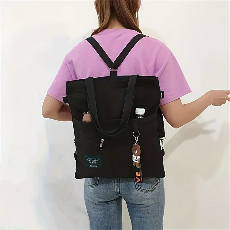 Bolso de hombro de lona para mujer, mochila versátil con decoración de parche de Letras a la moda