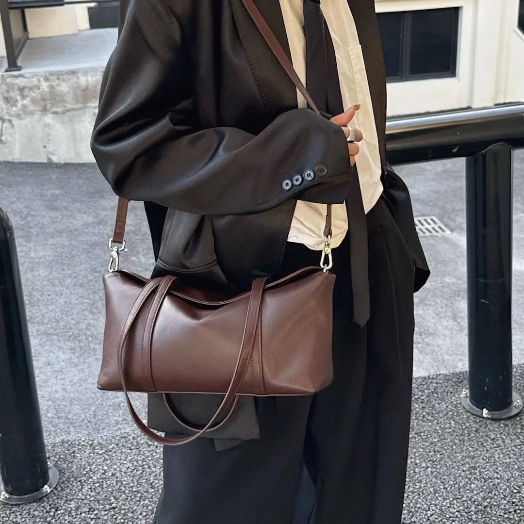 

2025 Новая простая повседневная ручная женская сумка Niche Boston из воловьей кожи, универсальная сумка-подушка большой вместимости