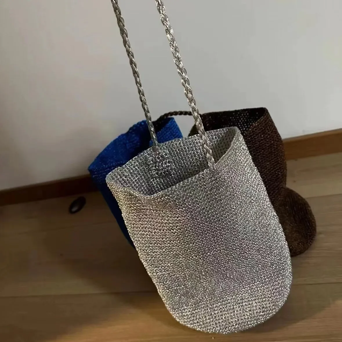 

Luxury Silver Bucket Bags for Women Hollow Woven Shoulder Bag Fashion Knitting Designer Bags Women Handbags NEW Shopper Purses