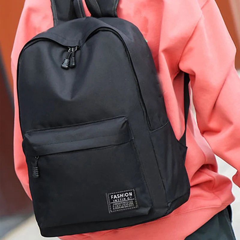 Men's backpack made of nylon, suitable for school, business trips and single or double shoulder carrying - solid color design
