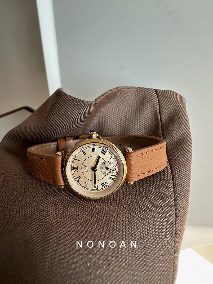 

ClassicRoman numeral leather strap watch for womenretro round designexquisite and sophisticatedsimple stainless steel wristwatch