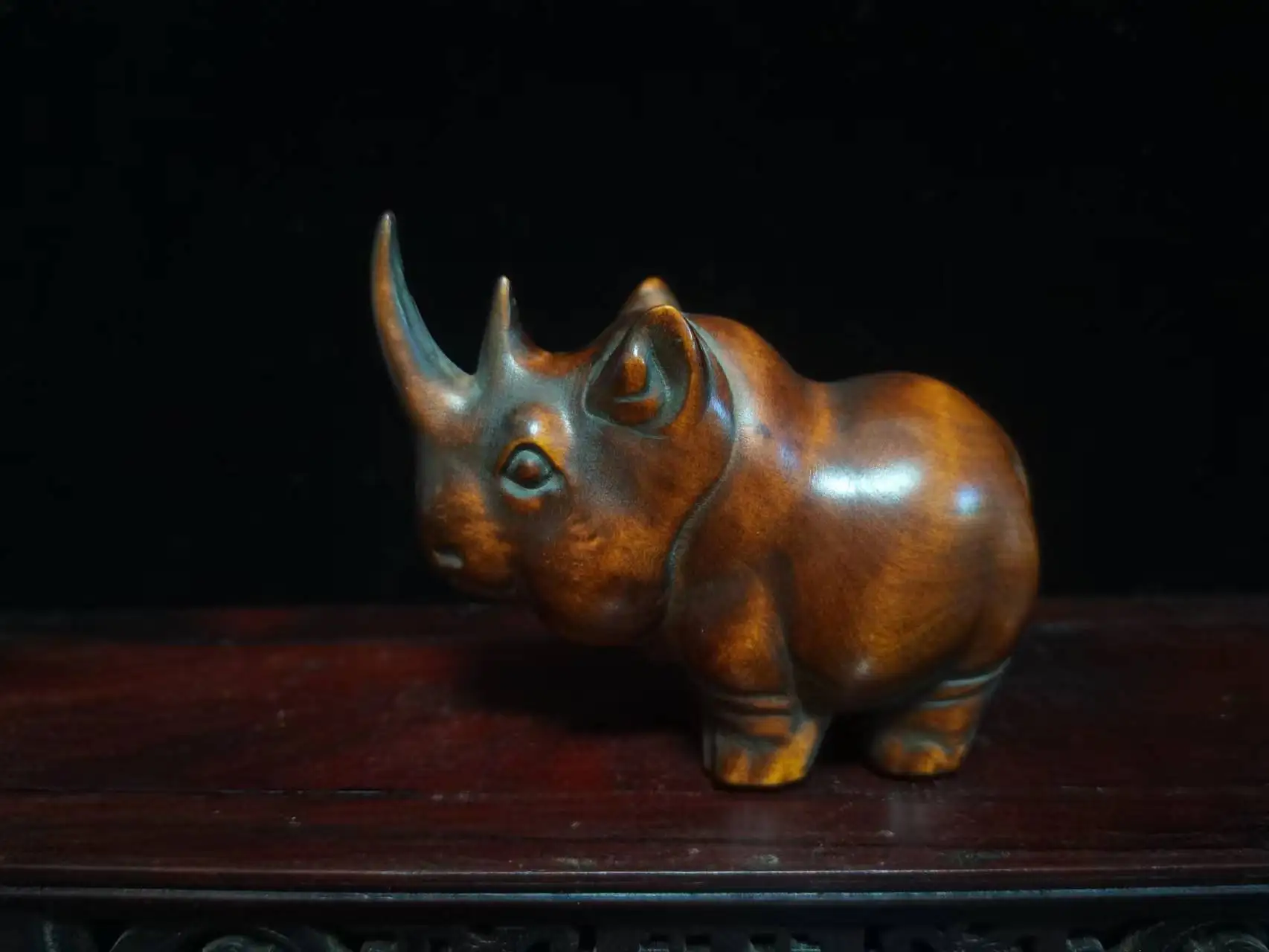 Boxwood Laobao pulp pure handmade wood carving rhinoceros to turn the world around ornaments collection