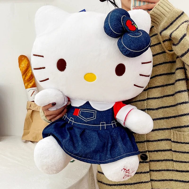 

Мягкая плюшевая игрушка Hello Kitty в джинсовой одежде с бантом в виде яблока, милая подушка-игрушка, подарок для девочек, декор для детской комнаты