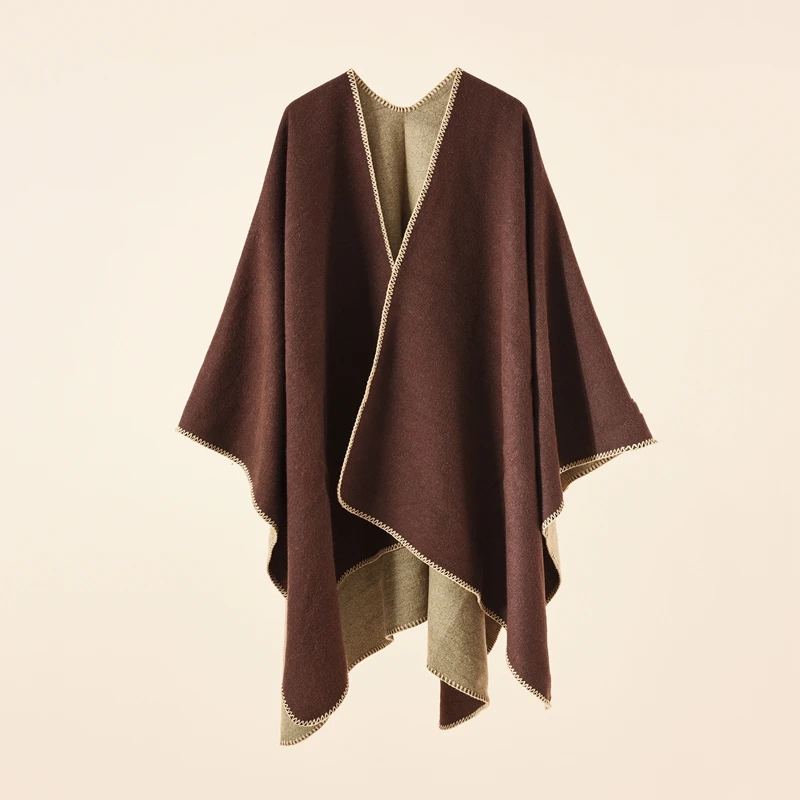 A lady\'s shawl a plain colored, casual, elegant shawl worn by a socialite to keep her warm during winter travel