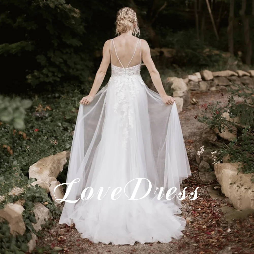 Lovedress boêmio com decote em v vestido de casamento sem mangas rendas apliques praia dividir vestido de noiva sem costas tule botão personalizado