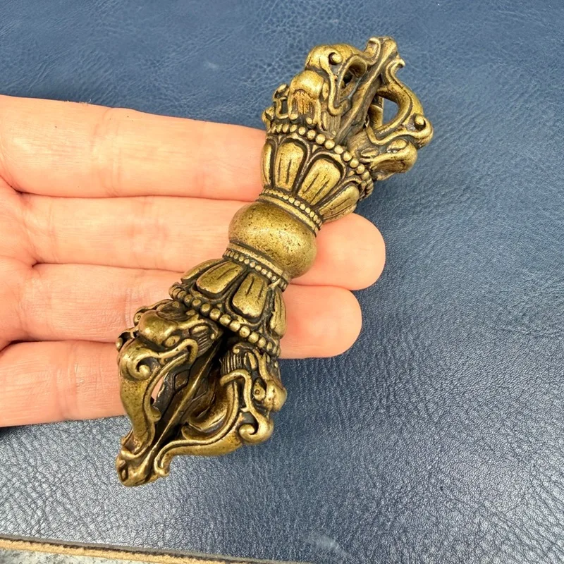 - brass - artifact, Tibetan- collectible, antique-style distressed five-pronged vajra pendant