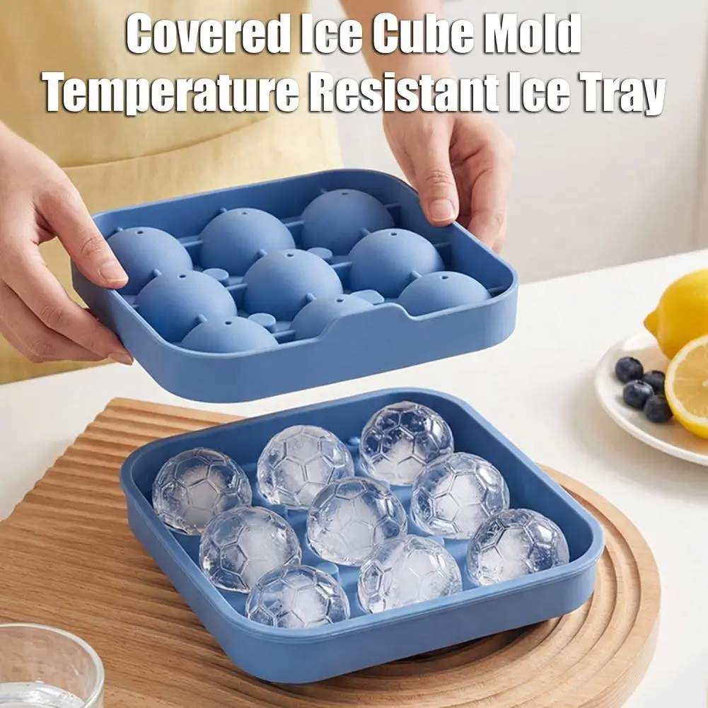 

Ice Cube Mold Covered Dust-Proof Silicone Ice Cube Maker with Water-Draining Design 9-Compartment Food-Grade Silicone Football S