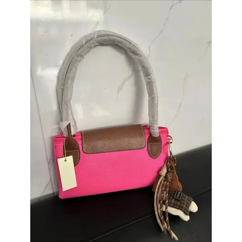 Large French style nylon handbag 2026, popular, soft, classic, with pendant, women's multifunctional handbag shopping bag