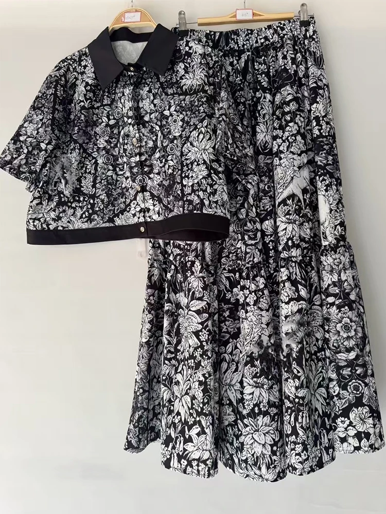 الربيع والصيف جديد قطعتين واحدة الصدر قصيرة الأكمام المطبوعة قميص قصير عالية الخصر تنورة على شكل حرف A بدلة نسائية الموضة