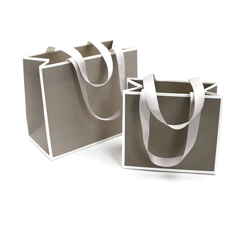 Custom logo new design  luxury jewelry packaging ribbon handle paper bag