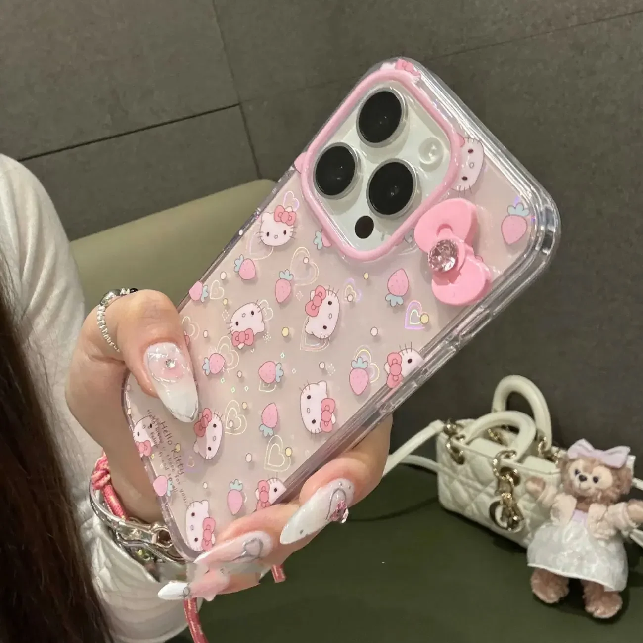 Sanrio-funda de teléfono con soporte de Hello Kitty para iPhone, carcasa con lazo láser para iPhone 16, 15, 14, 12, 13, 11 Pro Max, XR, XS MAX, 7, 8 PLUS, MINI Y2K