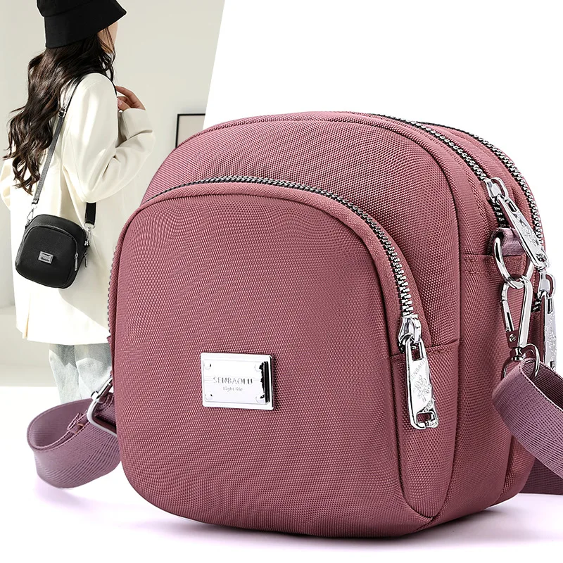 Mini bolsa feminina concha, tecido de nylon, um ombro, bolsa tiracolo para celular casual e simples, nova tendência, outono e inverno, 2023