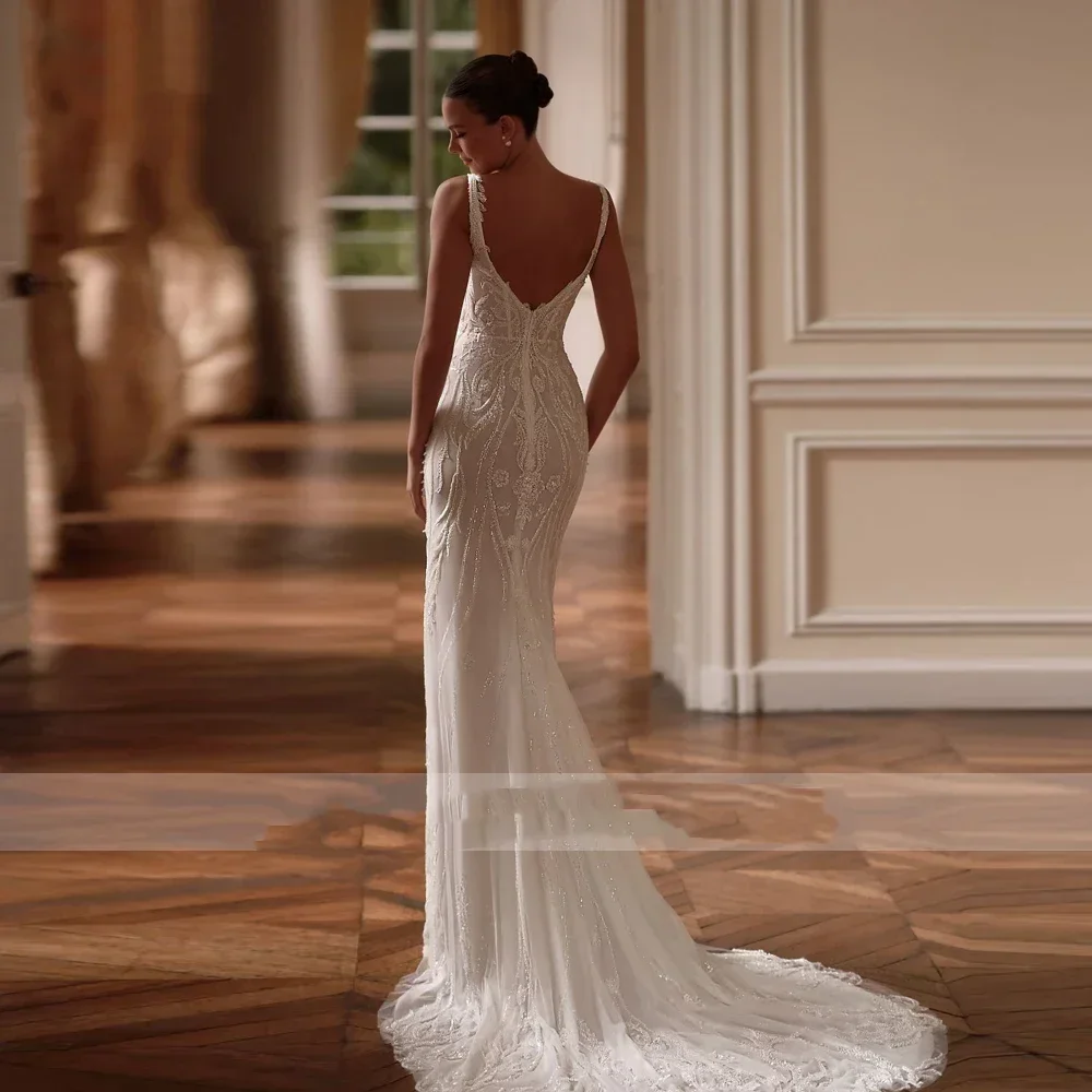Abiti da sposa sexy personalizzati a sirena Abito da sposa con strascico staccabile con applicazioni senza maniche a cuore