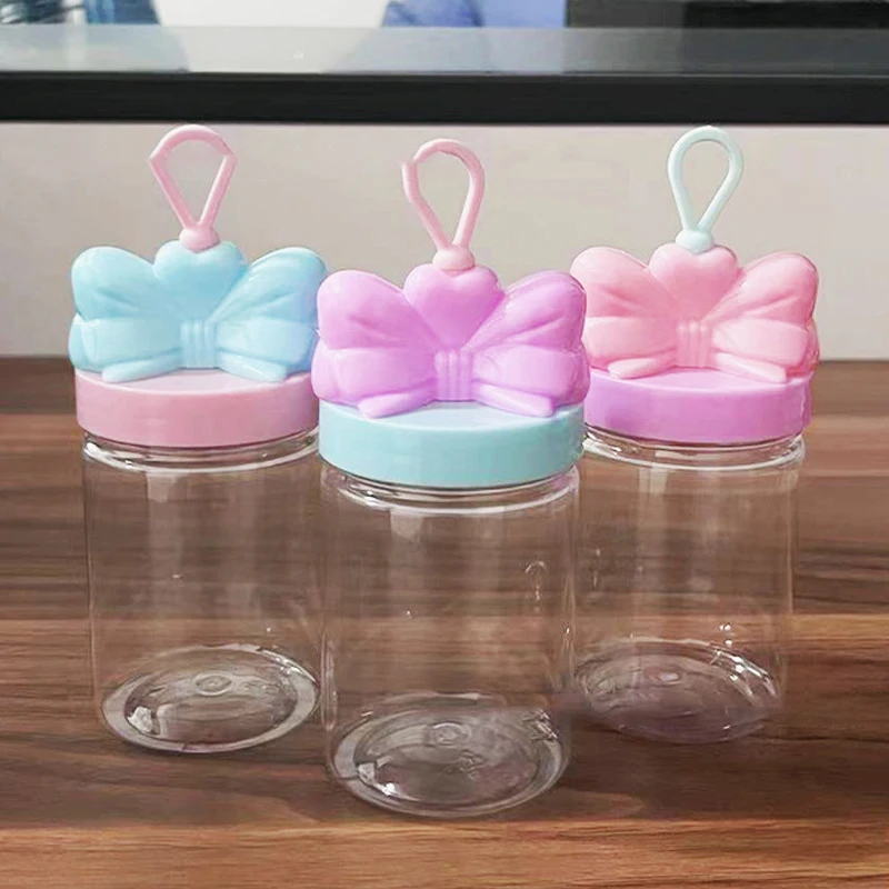 1PCS Bow Cartoon Plastic Bottle Transparent PET Food Grade Candy Bottle Random Color