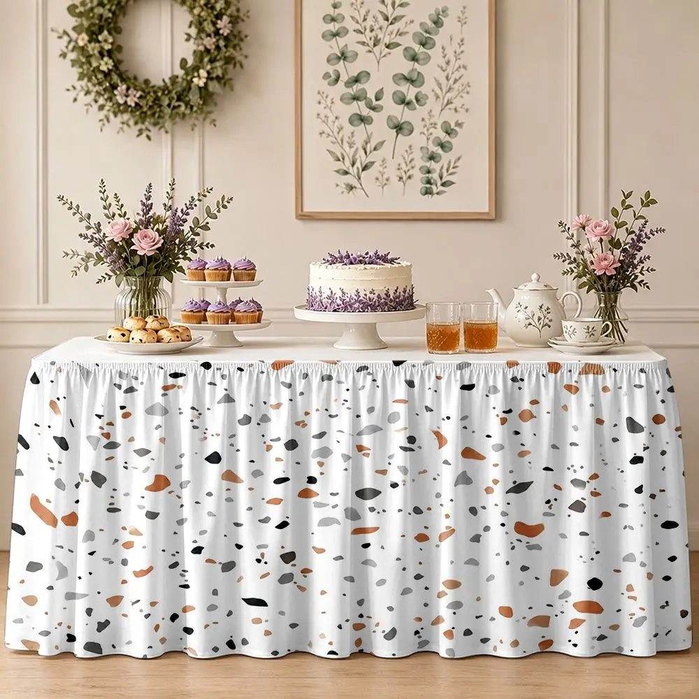 One-piece table skirt decoration with waterstone pattern, orange, gray and black dotted design, and ruffled edge tablecloth.