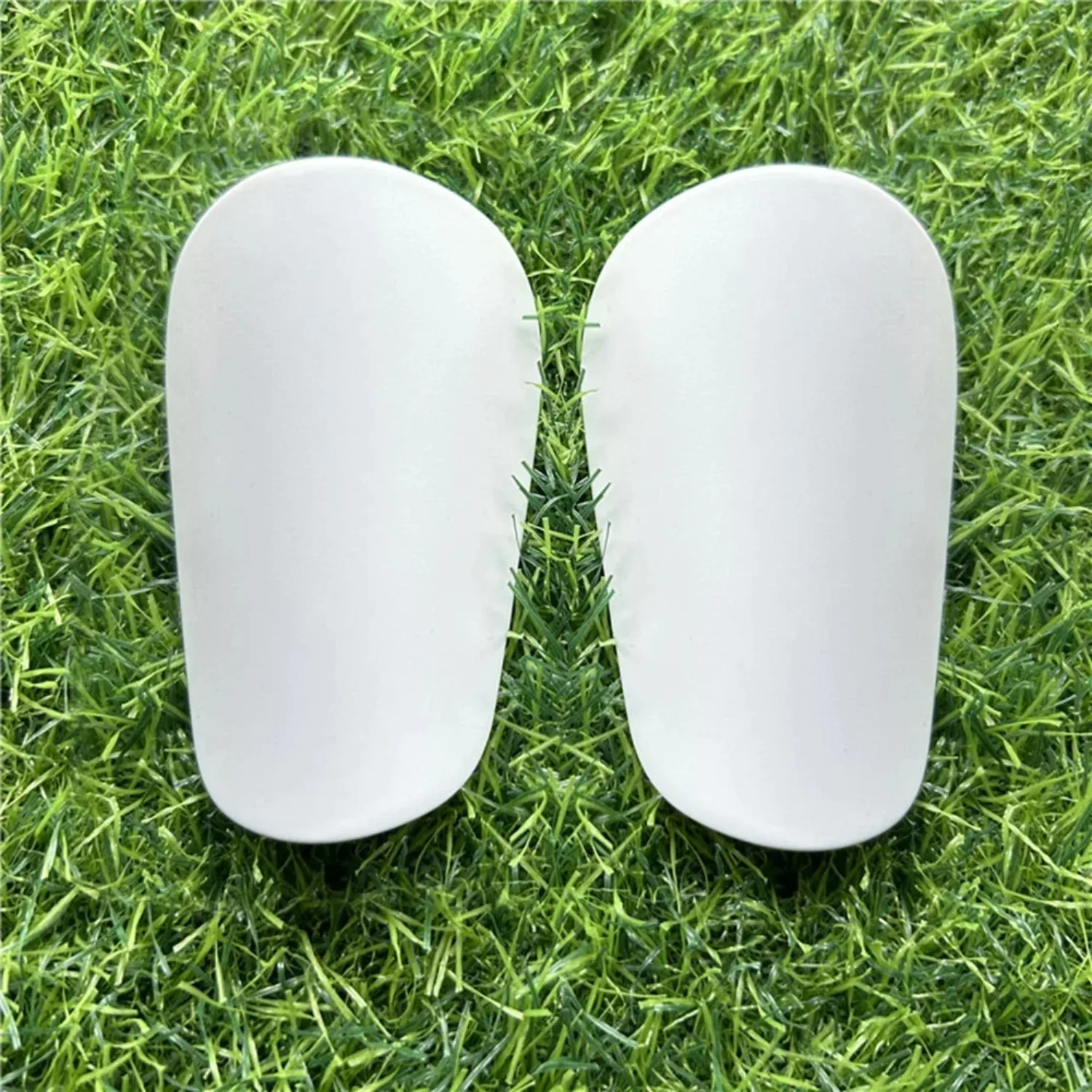 1 ペアのすねパッド耐摩耗性衝撃吸収レッグプロテクターミニすねガードサッカーすねガード男性女性子供男の子女の子用