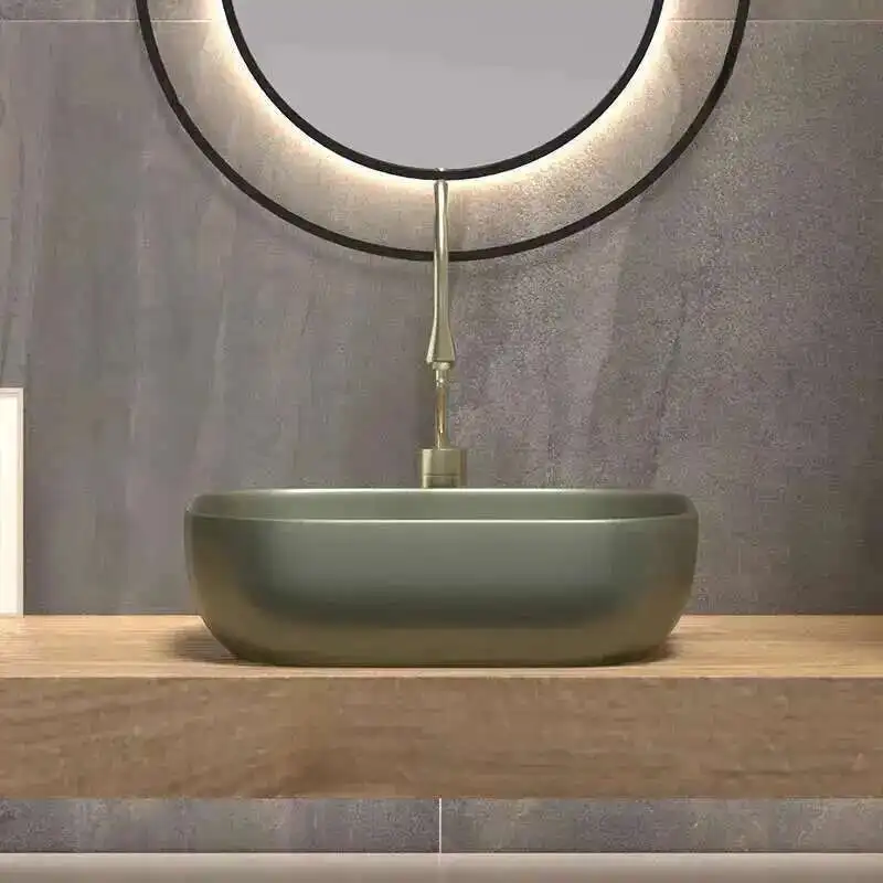 

Simple Ceramic Sinks for Toilets Nordic High-end Deep Above-the-counter Basin Luxury Oval Designer Bathroom Sink for Balcony