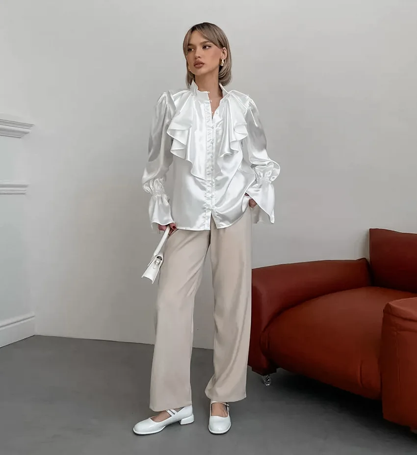 

New palace style lotus leaf edge small standing collar shirt with French temperament and glossy trumpet sleeves for women