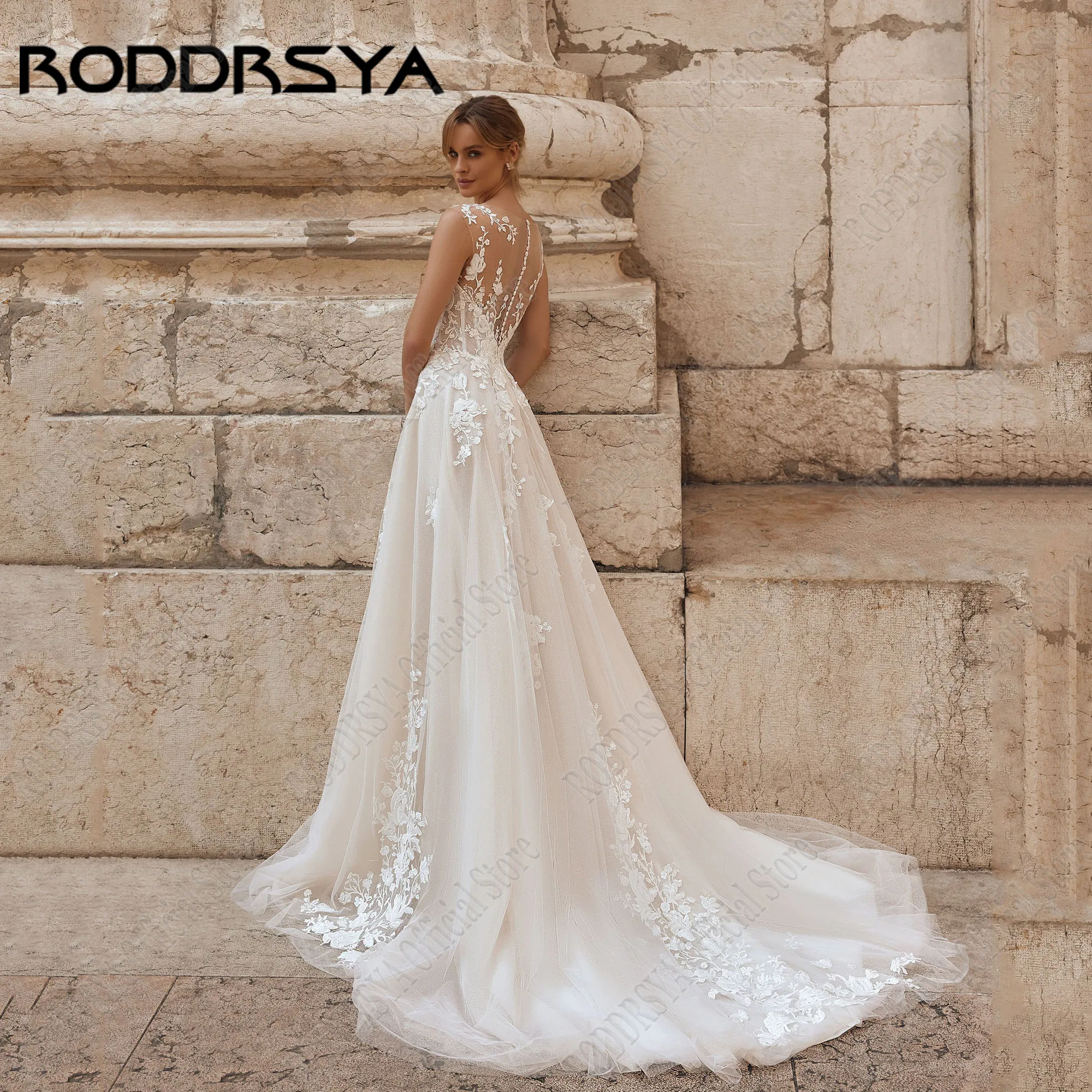 RODDRSYA فساتين زفاف متلألئة مخصصة قبعة فاخرة كم مجرد وهم الظهر Vestidos De Novia فستان العروس قطار الاجتياحRoddrsya لامعة الزفاف العرف الفاخرة قبعة الأكمام جيب كبير فانتوم صدرية دي نوفيا فستان الزفاف اكتساح ساحة القطا