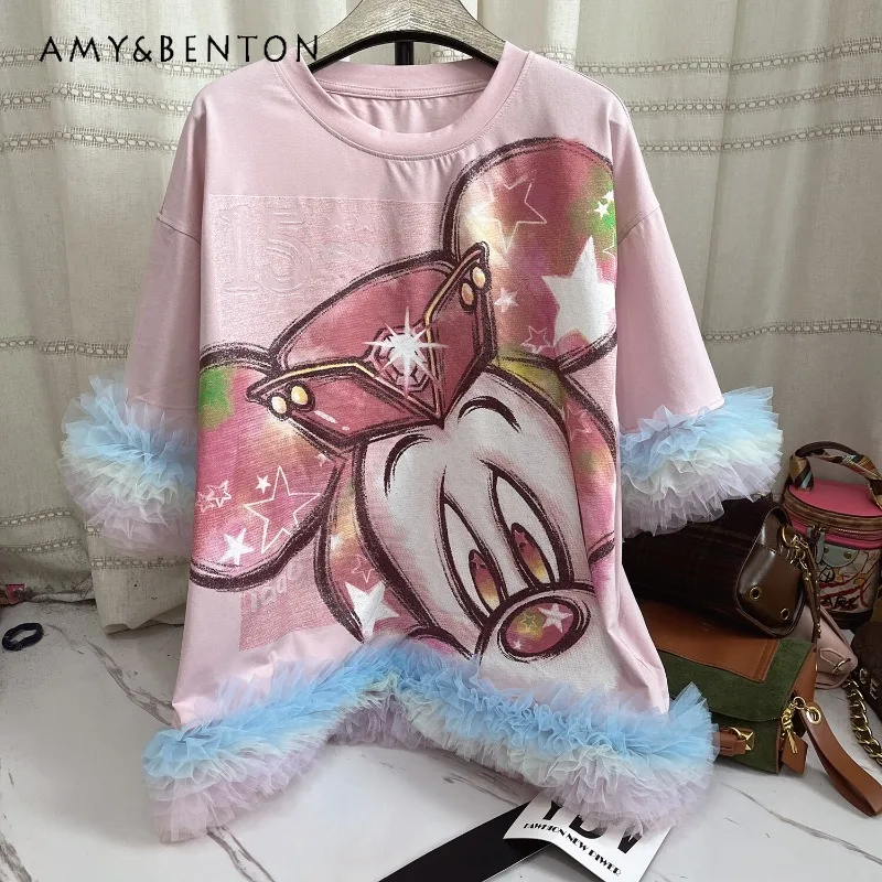 

Новая летняя футболка в европейском стиле: свободный крой оверсайз, универсальный дизайн с цветными вставками, короткий рукав, топ-пуловер с декоративной отделкой.