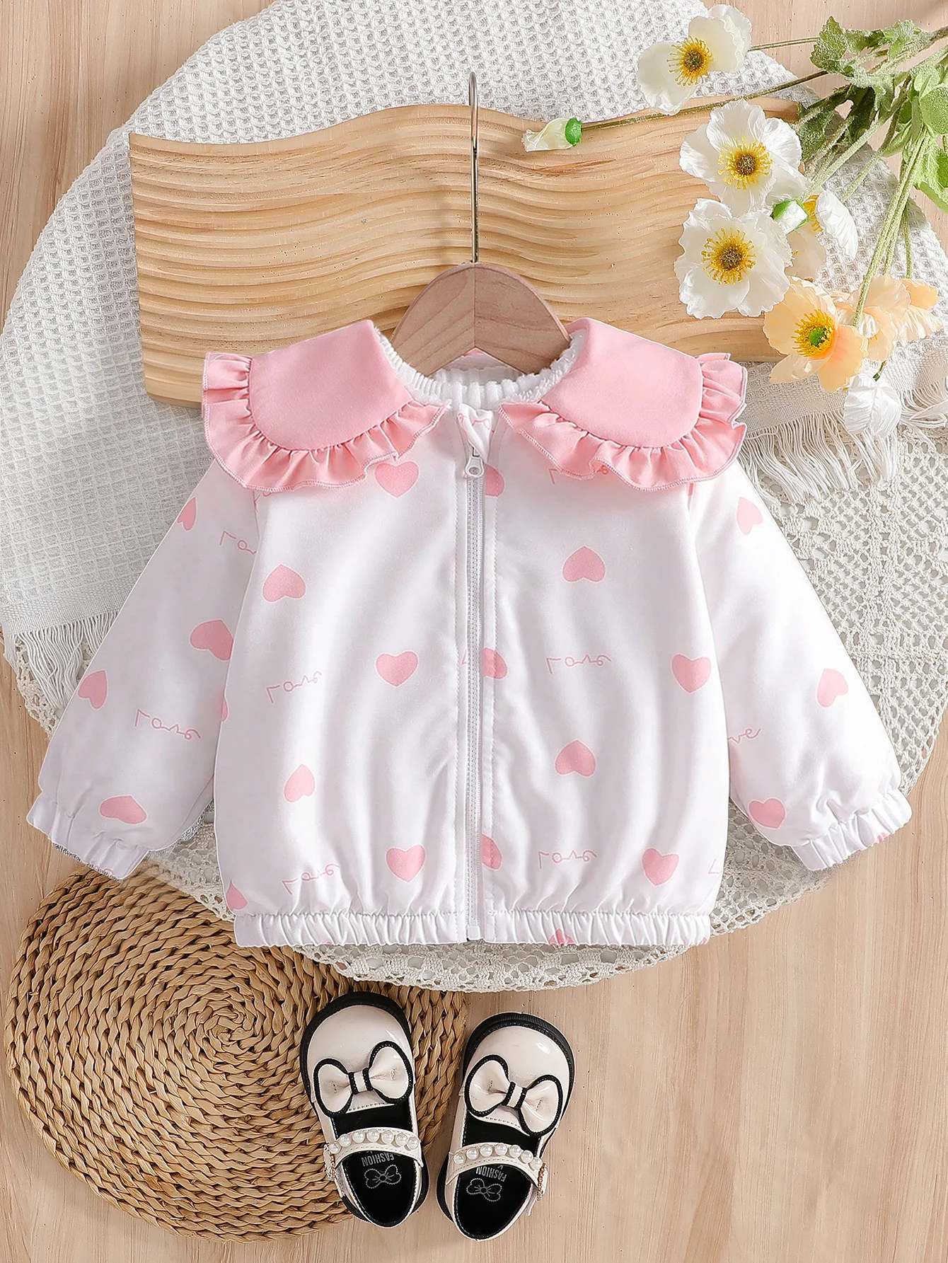 

“Baby girl’s fall wear: This pink-white heart coat (ruffled collar, cute) is ideal for outings—great Valentine/birthday gift.”