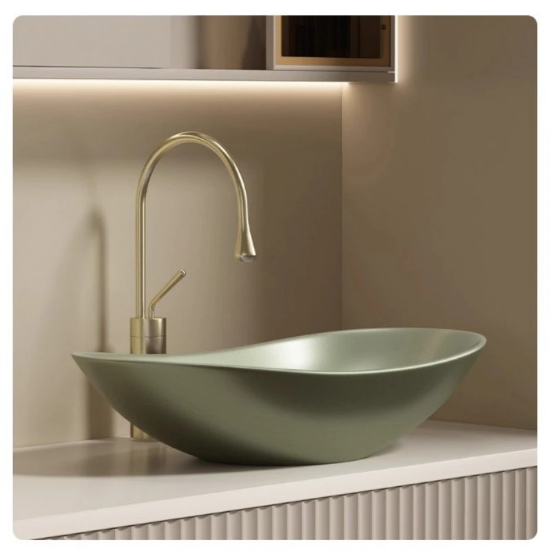 Oval art basin light luxury ingot ceramic wash basin household table basin olive nut green metal texture hotel style