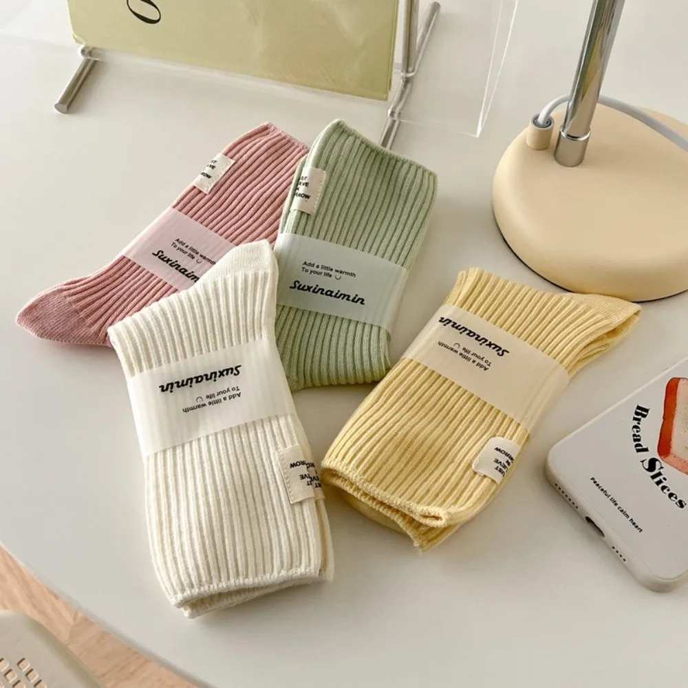 

High Quality Harajuku Sports Socks Cotton Knitted Women Socks Letter Label Design Elastic Middle Tube Socks Autumn Winter
