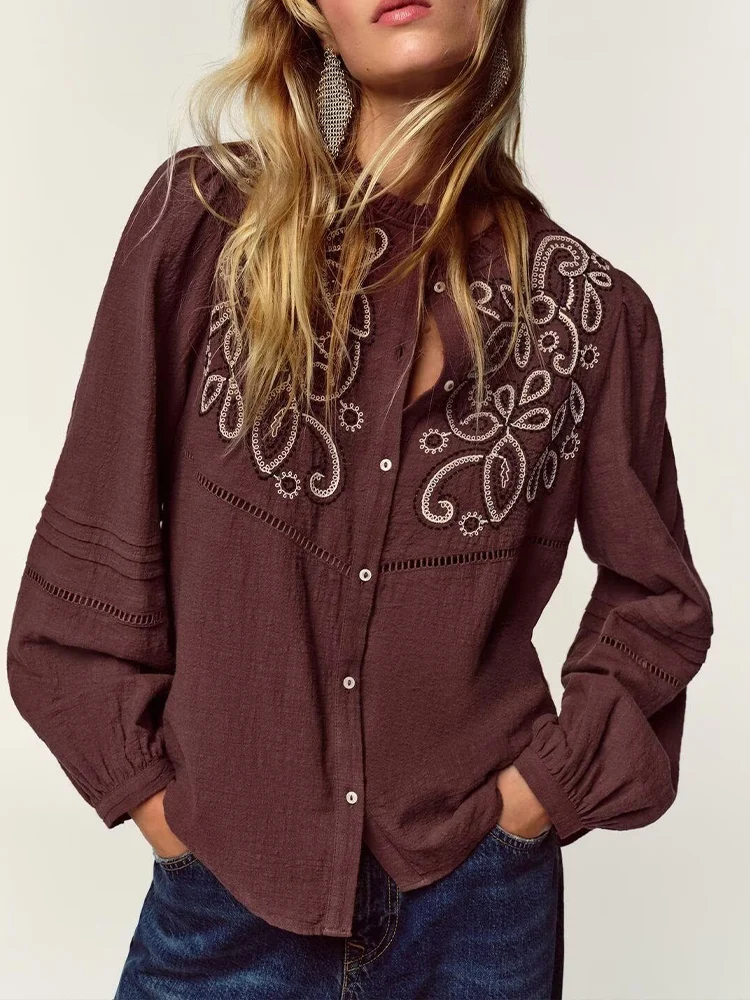 

European style new women's fashionable and versatile round neck long-sleeved shirt with embroidered chest.