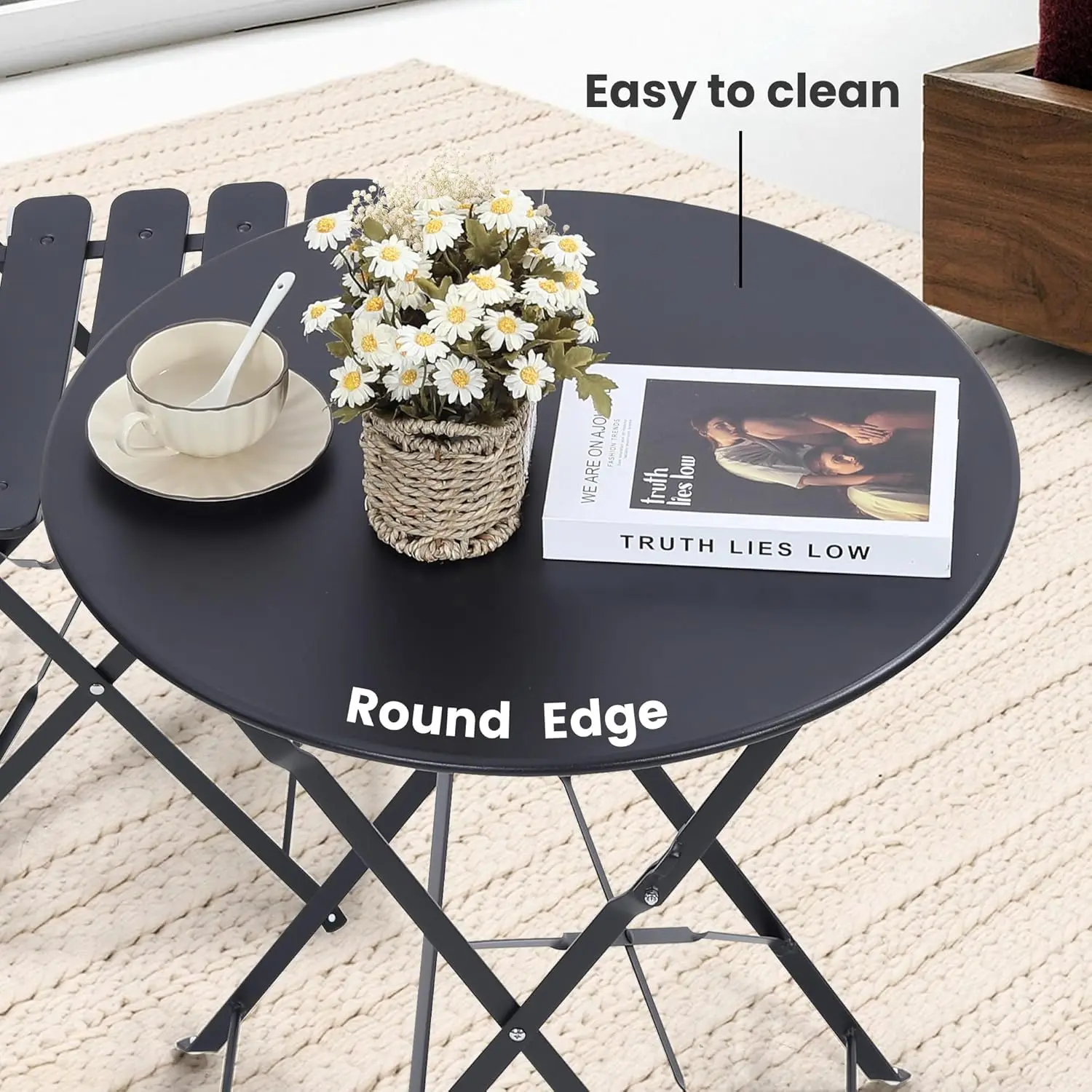 Space-saving black 3-piece foldable outdoor bistro set consisting of one folding coffee table and two matching chairs, ideal compact furniture for small balcony and private garden use view 3