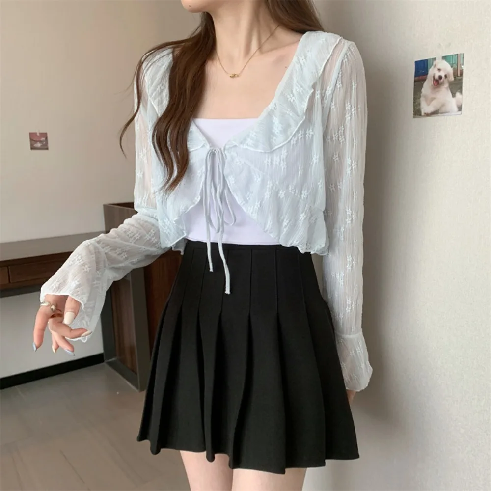 سترة صوفية رقيقة واقية من الشمس على شكل زهرة زهرية على شكل حرف V شفافة من خلال أكمام طويلة محبوكة واقية من الشمس ملابس شاطئ بحافة مكشكشة