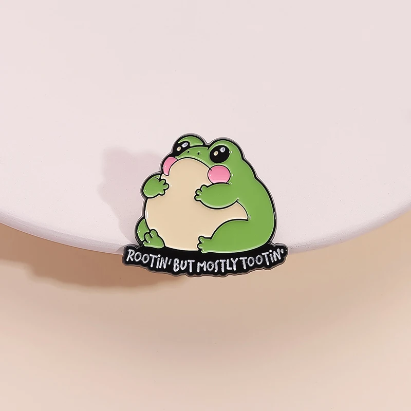 

Rootin But Mostly Tootin Enamel Pin Pink Shy Frog Brooch Lapel Badge Fashion Animal Jewelry Wholesale Gift For Kid Friends ﻿