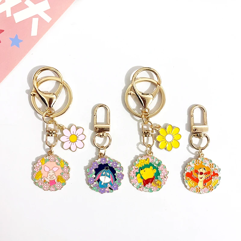 Disney Pooh Bear Piglet Tigger flor corona diseño dibujos animados llavero de Metal bolsa de maquillaje cremallera decoración colgante regalo de cumpleaños
