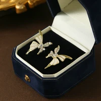 Boucles d'oreilles papillon en émail pour femmes, couleur blanche, Animal, nouvelle tendance, amour coréen, esthétique, vie quotidienne, bijoux minimalistes 3