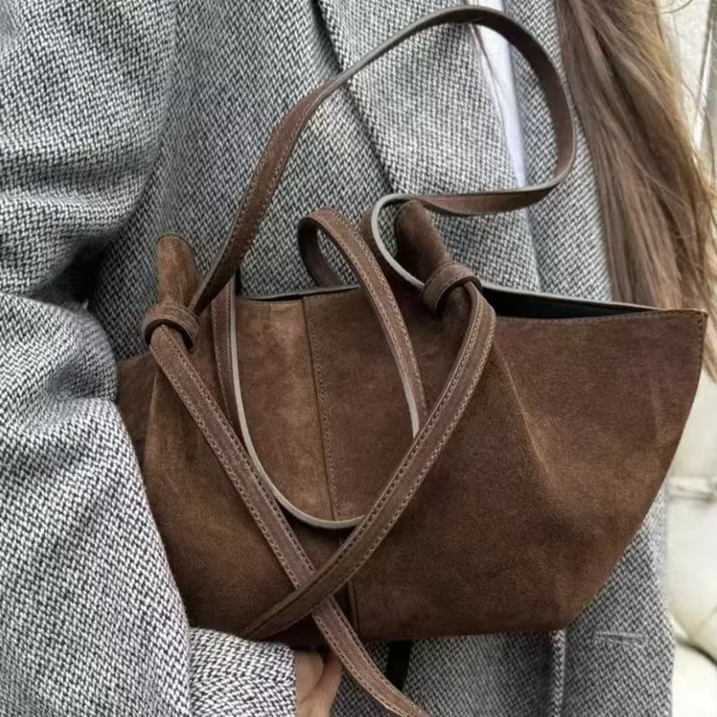 

Fashionable tote bag with niche design, simple hollow out women's bag, commuting texture women's beach shoulder bag