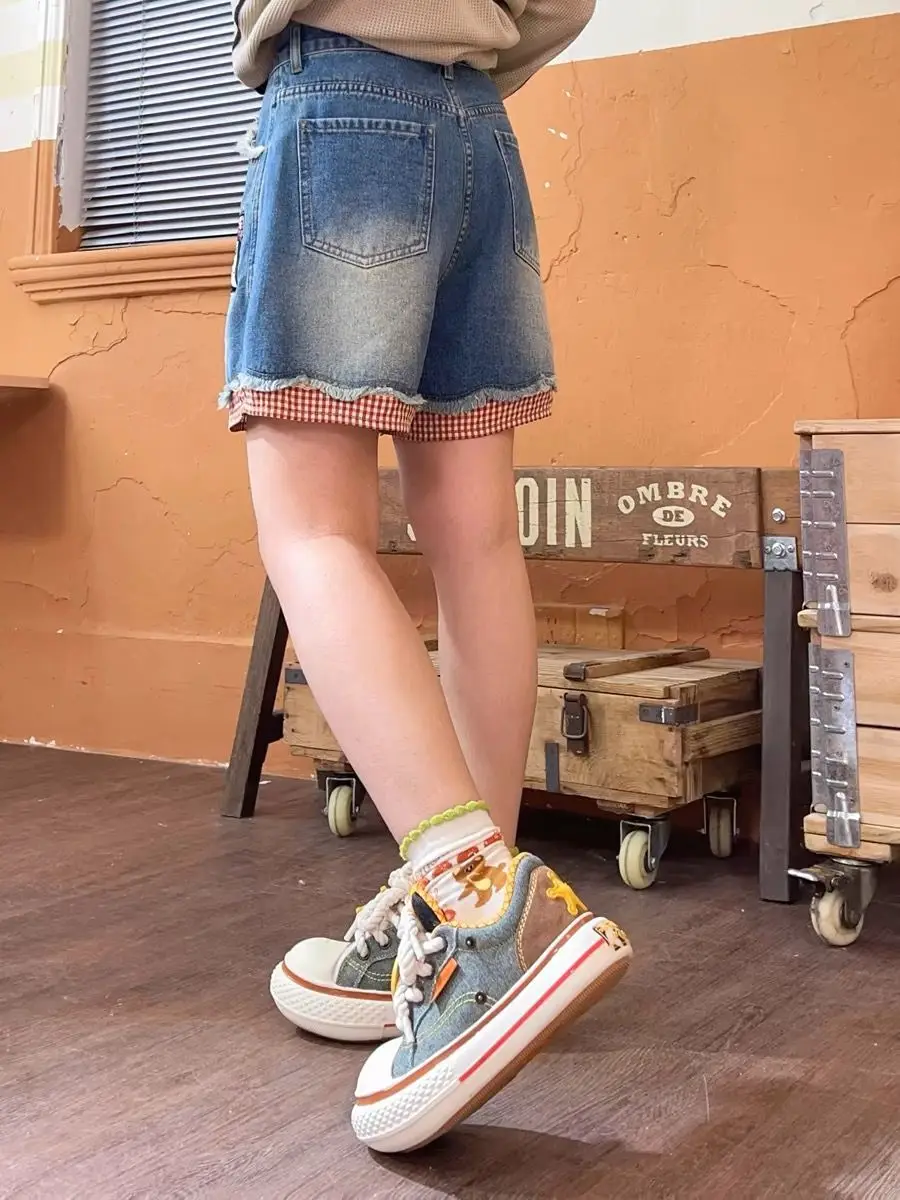 Cartoon Printed Denim Shorts Women 2025 Summer New Niche Design Sense Splicing Plaid Design Burr Straight Middle Pants
