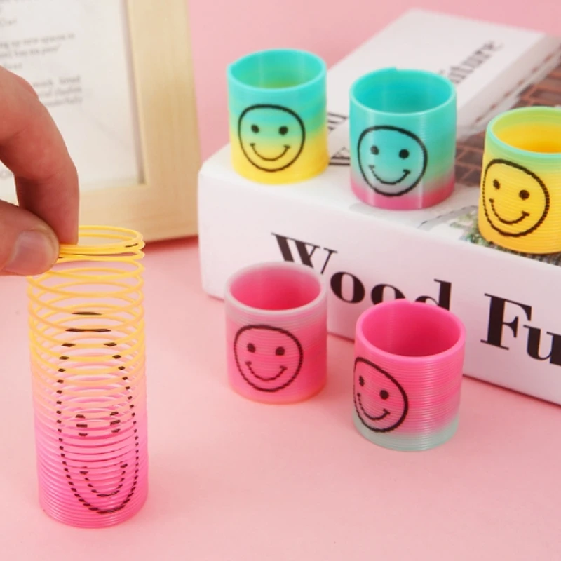 12 pcs/bag 3.2*3.5cm Mini emoji rainbow circle Ring Magic Colorful Spring Big Coil Toy Plastic Rainbow Magic flexible Spring