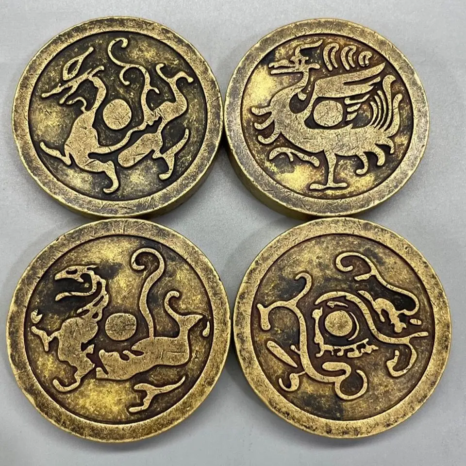 

A set of retro pure copper solid brass four mythical beast paperweights