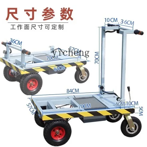 Il camion elettrico a pianale A1 tira il camion da cantiere a quattro ruote con piastrelle in ceramica nel carrello di vetro dell'ascensore