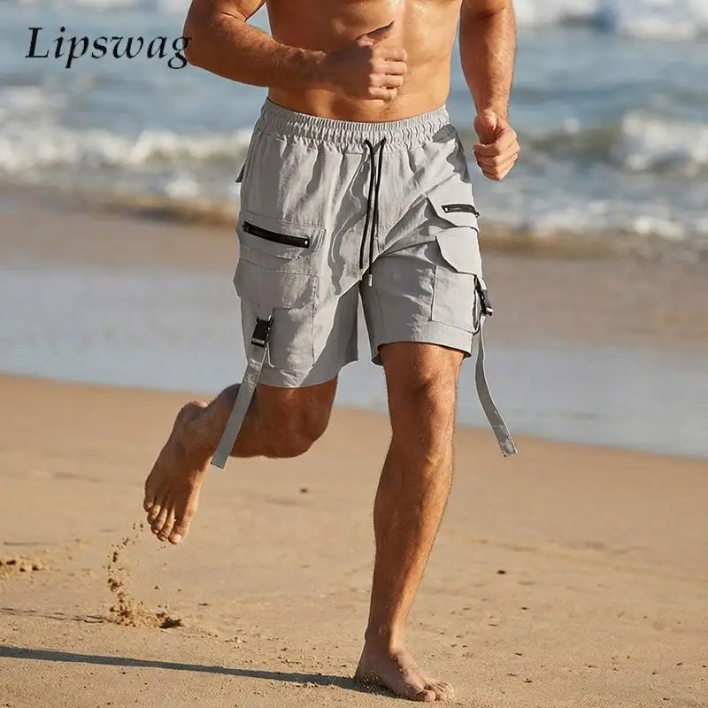 

Стильные мужские свободные прямые шорты-карго, уличные повседневные лоскутные штаны с несколькими карманами, мужские весенне-летние модные шорты на шнуровке