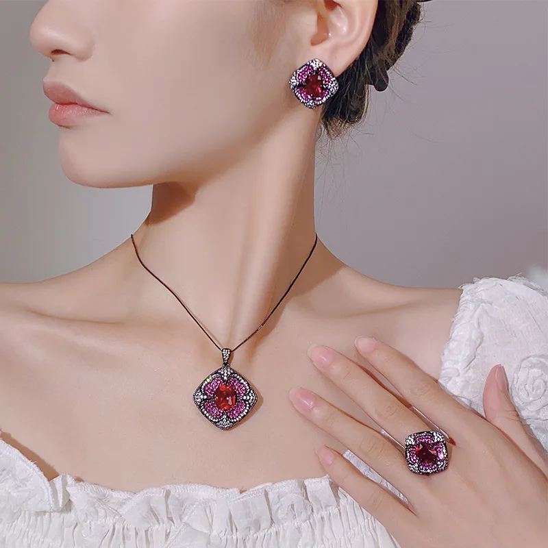 

New style jewelry set: earrings, necklace and ring, fashionable and elegant, suitable for women, with colored gemstones.