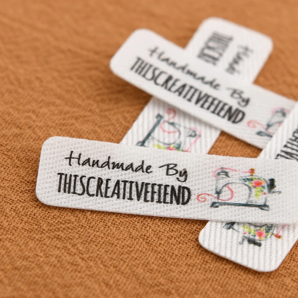 

Custom Iron On Cotton Labels 12.5x40mm Round Corner 98Pcs Washable White Iron or Sew On DIY Crafts Print Custom Name Logo