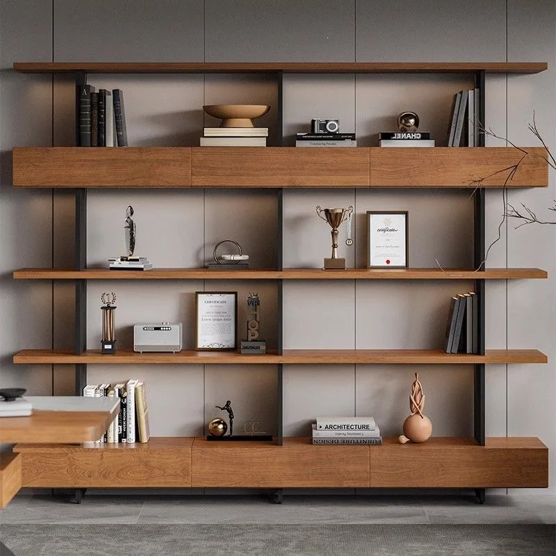 Bookshelf shelves are floor-to-ceiling, multi-level display and reading, all set against the wall